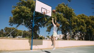 young-woman-making-basketball-jump-shot